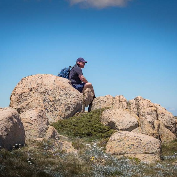 Man sitting on mountain