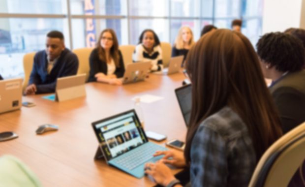 people sitting in meeting